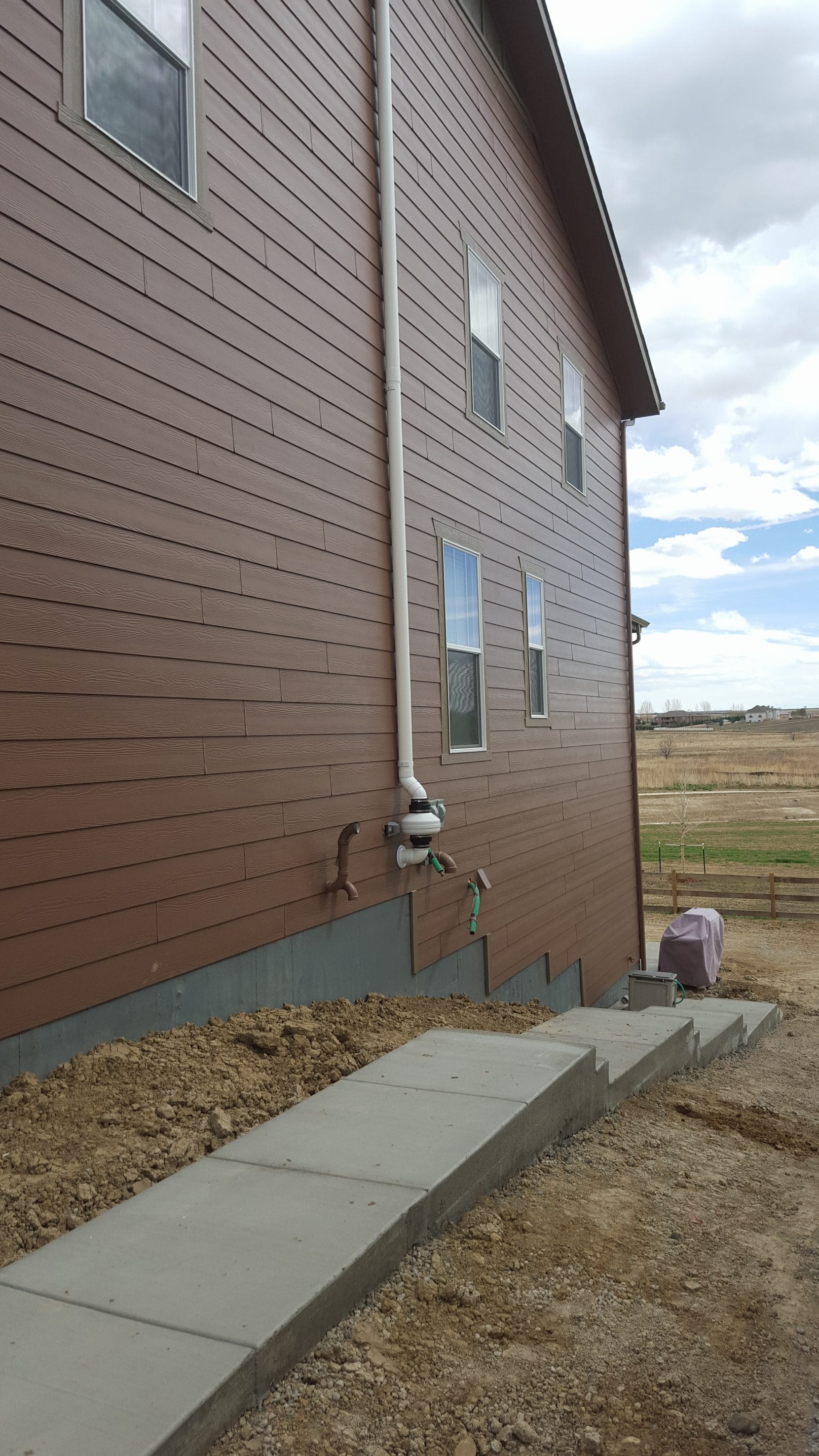 Exterior View of Radon Mitigation System Installation in Arizona
