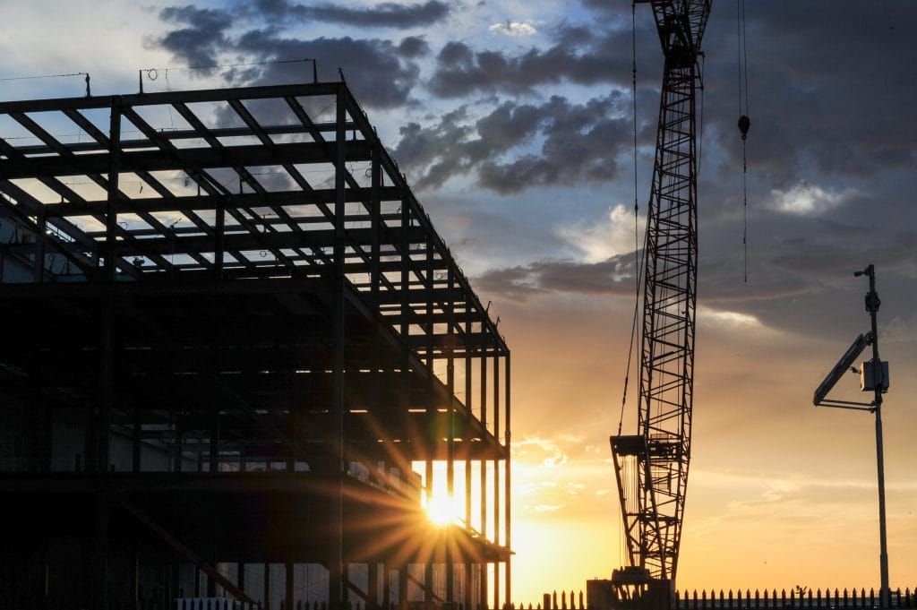 Commercial Building Construction Site at Sunset