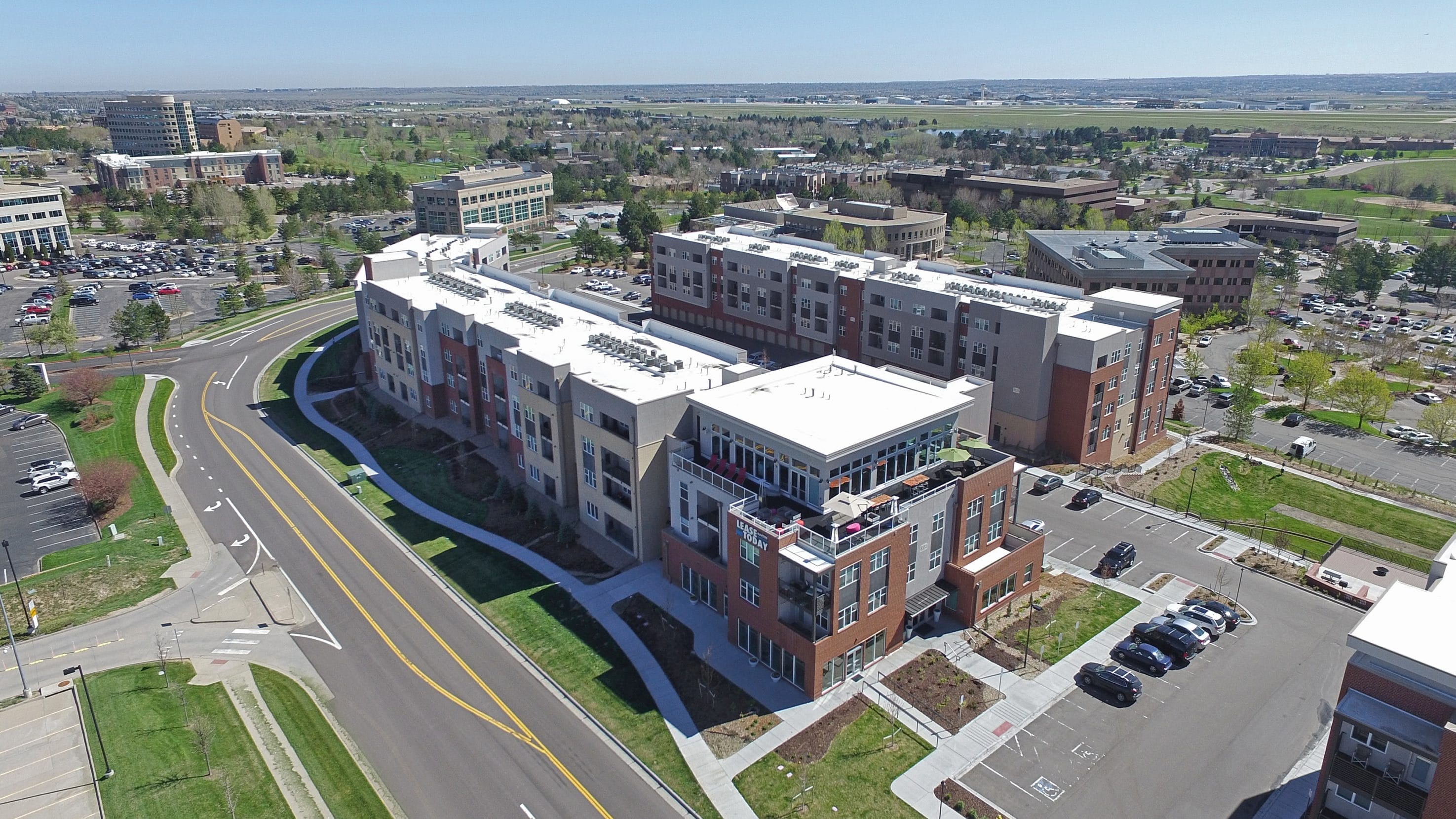 Aerial view of a commercial building complex for radon mitigation services
